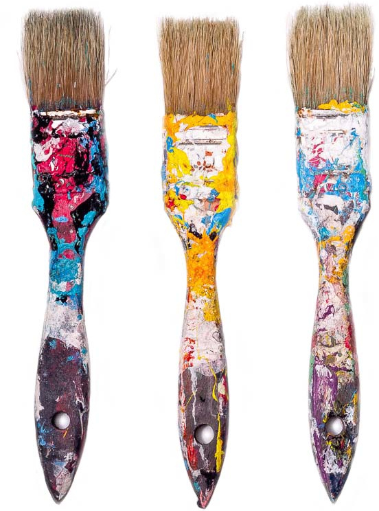 Three colourful paintbrushes
